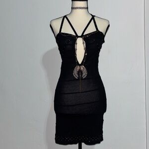 Strappy Black Mini Dress with Decorative Wing Pendant